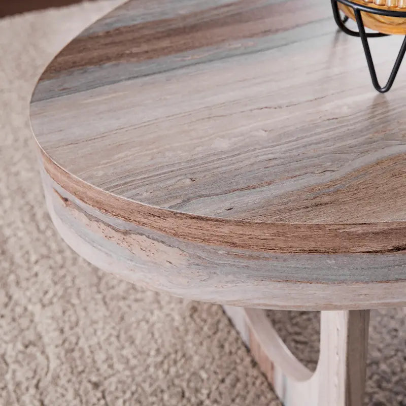 Mesa de centro ovalada contemporánea de mármol sintético con patas geométricas