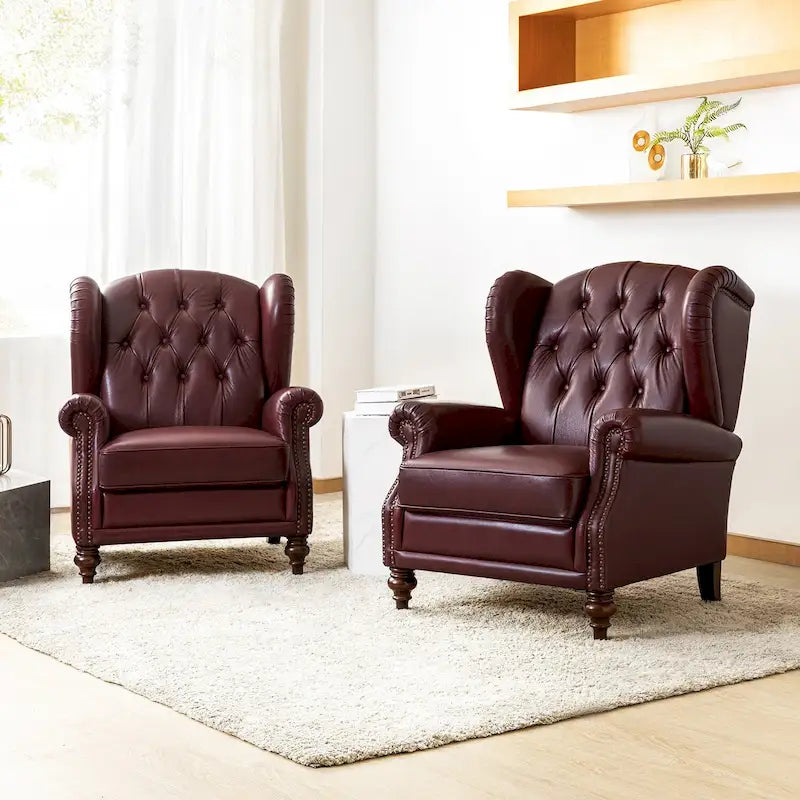 Poltrona wingback in similpelle con schienale alto e gambe in legno massello